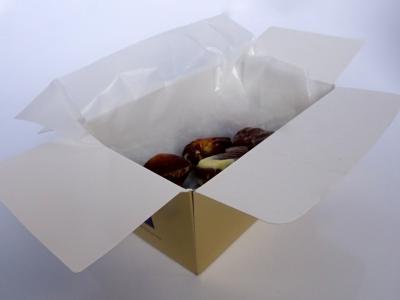 White cristal paper in a chocolate box